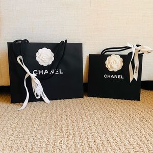 Chanel Black Paper Bags with White Camilla Flowers